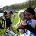 Huron High School players embrace after beating Pioneer on Tuesday, May 7. Daniel Brenner I AnnArbor.com